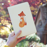 a girl holding personalized RFID blocking passport travel wallet with Autumn Treasure design