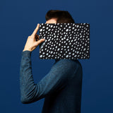 The form-fitting glossy hardshell case with Polka Dot design