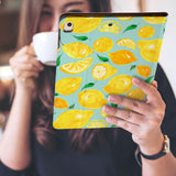 a girl is holding and viewing personalized iPad folio case with Futuristic design 
