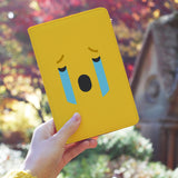 a girl holding personalized RFID blocking passport travel wallet with Emoji 2 design